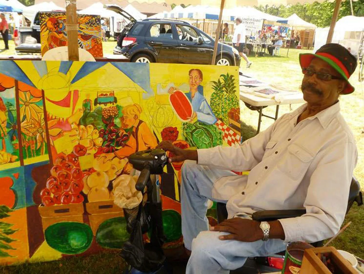 William Y. Cooper with one of his paintings